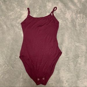 Women’s size small purple body suit